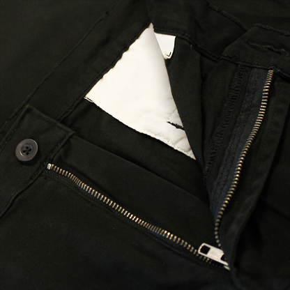 "Men’s black cotton stretch chino pants with slim straight leg, button and zip closure, belt loops, front hand pockets, and rear button-fastened pockets."