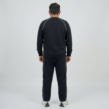 Black Embroidered Fleece Co-ord Set featuring a stylish embroidered top and matching trousers made from soft fleece fabric.