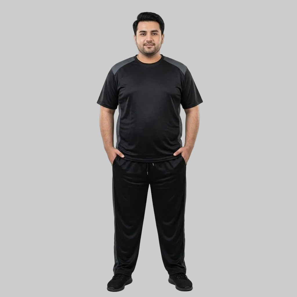 Men's Black & Grey Polyester Co-Ord Set featuring a crewneck T-shirt and matching trousers made from breathable mesh polyester fabric with grey contrast panels.
