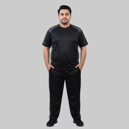 Men's Black & Grey Polyester Co-Ord Set featuring a crewneck T-shirt and matching trousers made from breathable mesh polyester fabric with grey contrast panels.