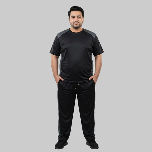 Men's Black & Grey Polyester Co-Ord Set featuring a crewneck T-shirt and matching trousers made from breathable mesh polyester fabric with grey contrast panels.