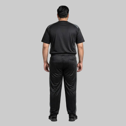 Men's Black & Grey Polyester Co-Ord Set featuring a crewneck T-shirt and matching trousers made from breathable mesh polyester fabric with grey contrast panels.