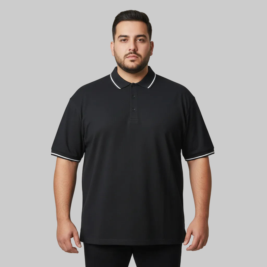 Black plus size polo shirt with white tipped collar and sleeve cuffs front view laid flat.