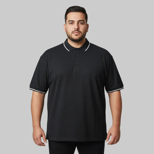 Black plus size polo shirt with white tipped collar and sleeve cuffs front view laid flat.