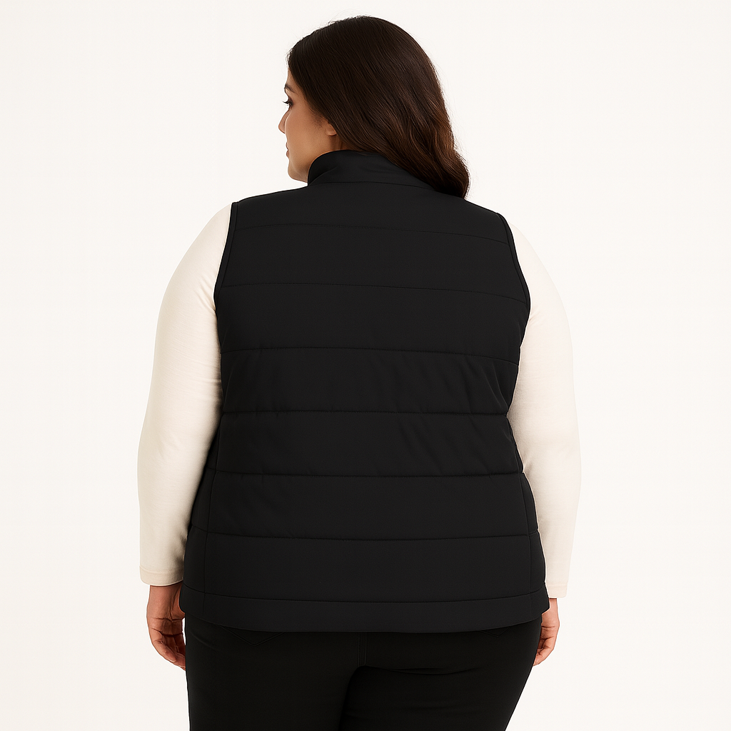 Plus size Pakistani female model wearing sleeveless puffer vest with quilted padded panels and welt pockets – casual outerwear