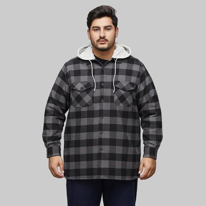 Black buffalo plaid flannel shirt jacket with removable fleece hood displayed on a clean studio background