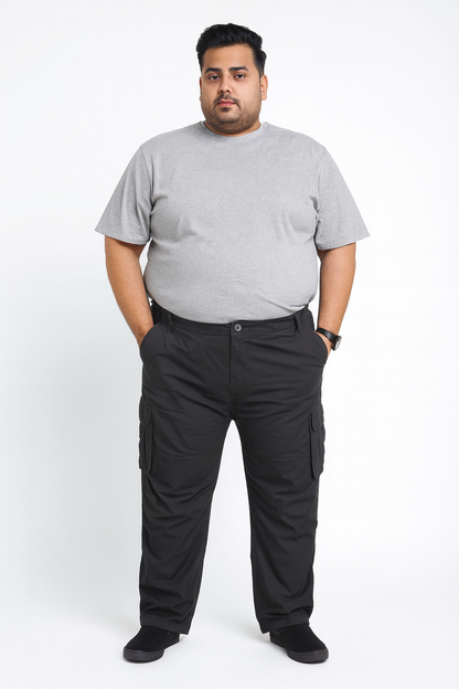 Black stretch cargo trousers with elastic waist and multiple pockets.