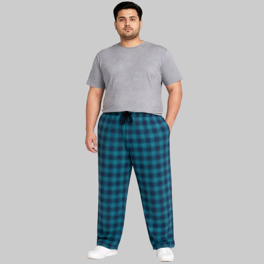 Blue plaid plus-size jersey lycra trousers with drawstring waistband, laid flat on white background