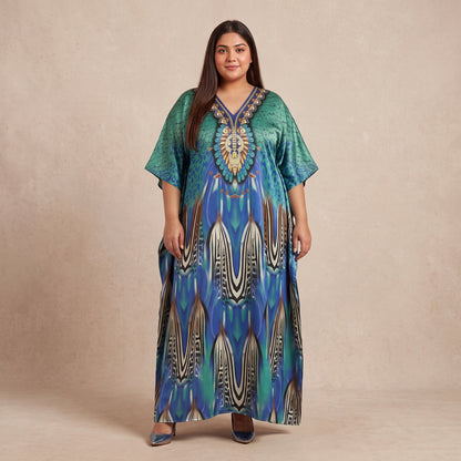 Blue and teal peacock feather motif maxi kaftan made from lightweight polyester with an elegant print and flowing silhouette.