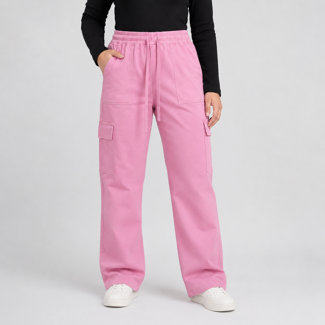 Blush Pink Cargo Baggy Trousers in premium 98% cotton, 2% elastane twill dyed fabric with relaxed baggy fit, elastic waistband, and utility cargo pockets.