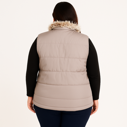 Plus size Pakistani female model wearing blush pink sleeveless puffer vest with faux fur collar, quilted padded panels, and welt pockets – winter outerwear