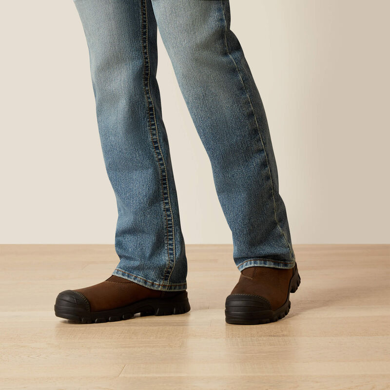 Plus-size male model wearing Breaker Slim Straight Fit Jeans in dark denim, front view, showing slim seat, straight leg opening, and reinforced workwear details.
