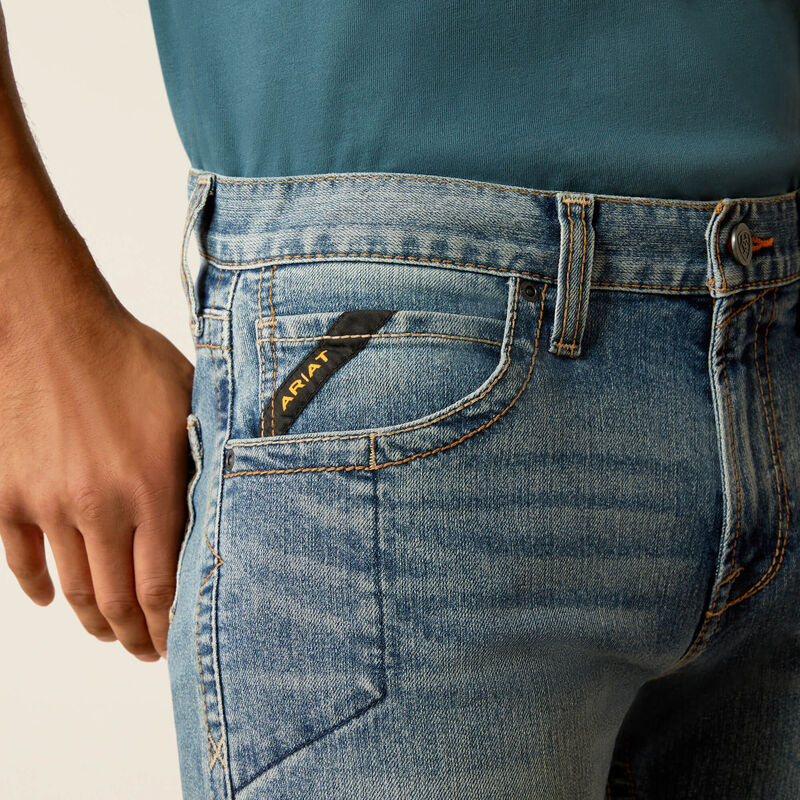 Plus-size male model wearing Breaker Slim Straight Fit Jeans in dark denim, front view, showing slim seat, straight leg opening, and reinforced workwear details.