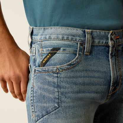 Plus-size male model wearing Breaker Slim Straight Fit Jeans in dark denim, front view, showing slim seat, straight leg opening, and reinforced workwear details.