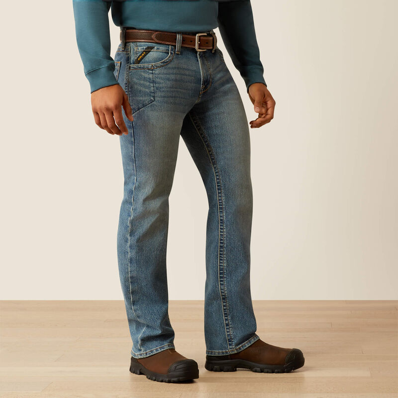 Plus-size male model wearing Breaker Slim Straight Fit Jeans in dark denim, front view, showing slim seat, straight leg opening, and reinforced workwear details.