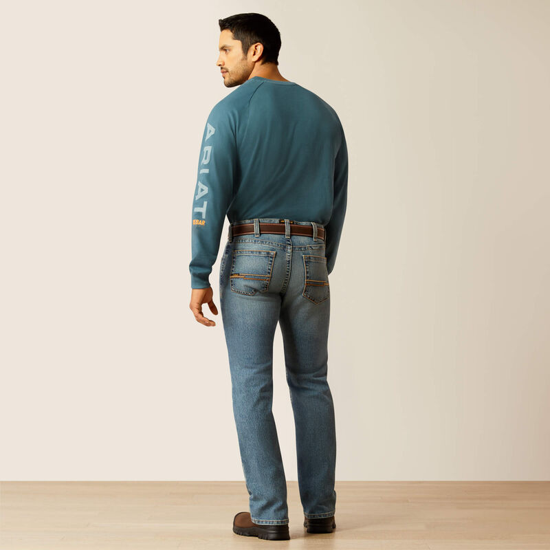 Plus-size male model wearing Breaker Slim Straight Fit Jeans in dark denim, front view, showing slim seat, straight leg opening, and reinforced workwear details.