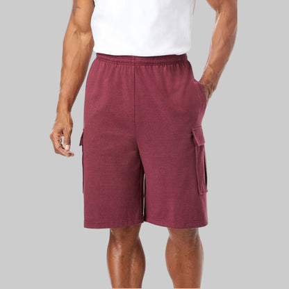 Men’s plus-size lightweight cargo shorts with elastic drawstring waist and multiple pockets, including tab-closure cargo pockets—perfect for casual or active wear.