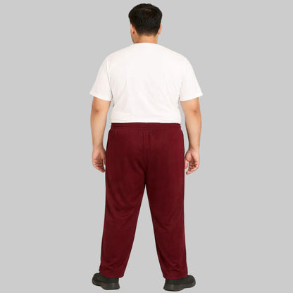 Burgundy mesh polyester plus size trouser worn by a male model, featuring breathable fabric and a comfortable relaxed fit