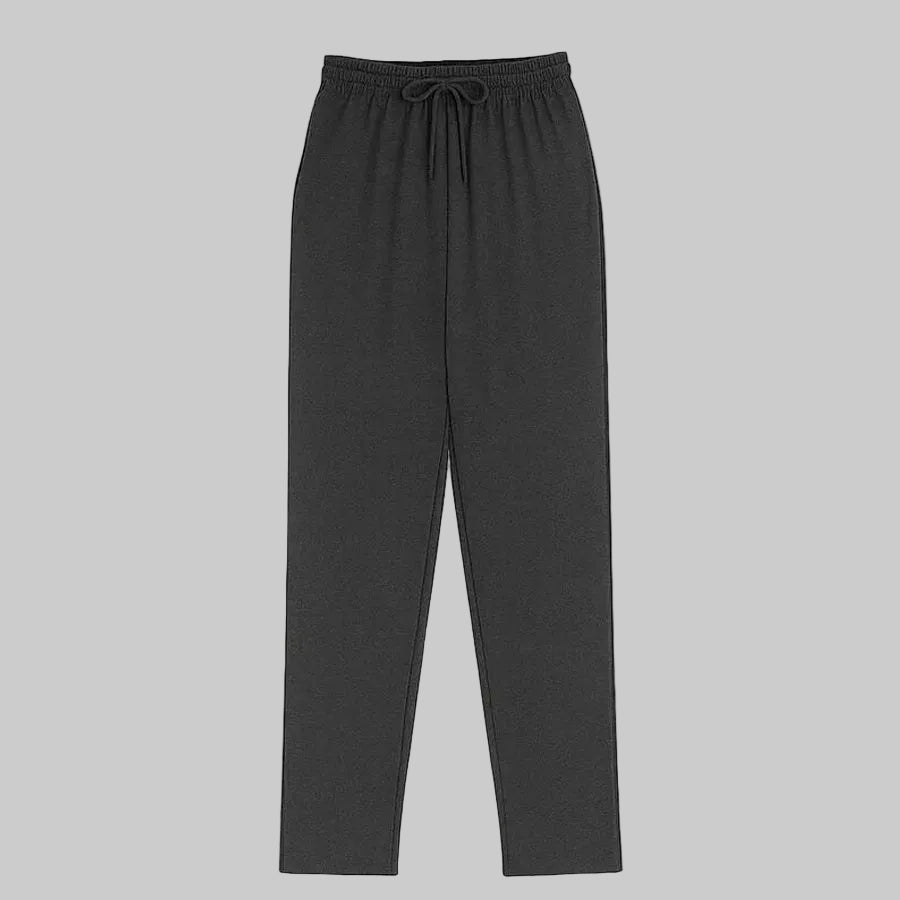 Pakistani plus size male model wearing charcoal side-striped trouser with elastic waistband and relaxed fit on white background