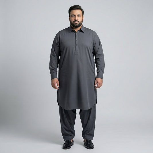 Man wearing a gray traditional outfit on a light gray background