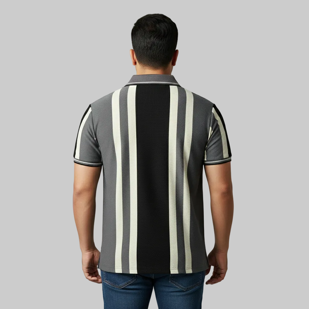 Charcoal grey and black vertical stripe polo t-shirt worn by a male model, featuring a classic collar and short sleeves on a studio background