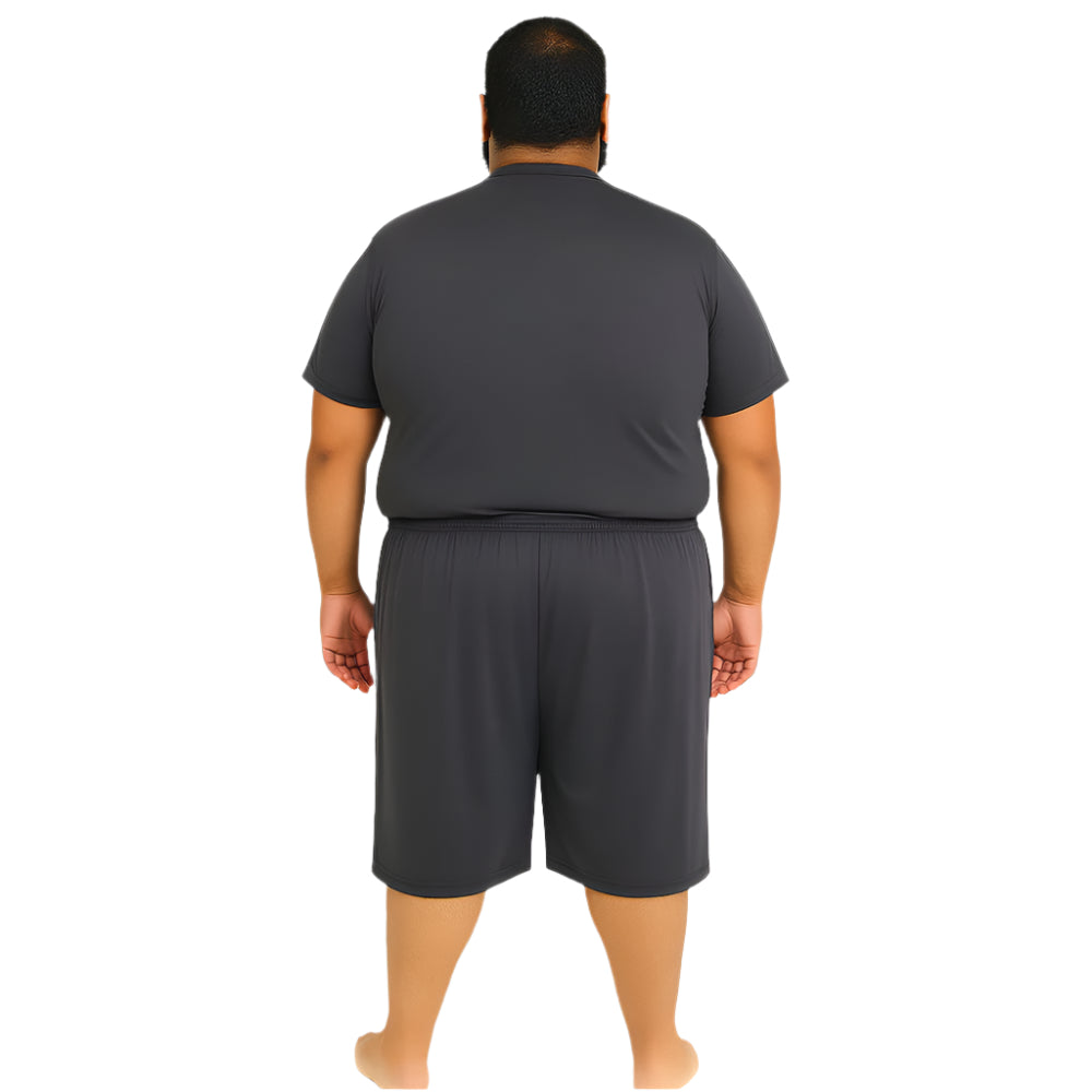 Plus-size Pakistani male model wearing charcoal three quarter Dry-Fit active shorts – front and back view, studio background