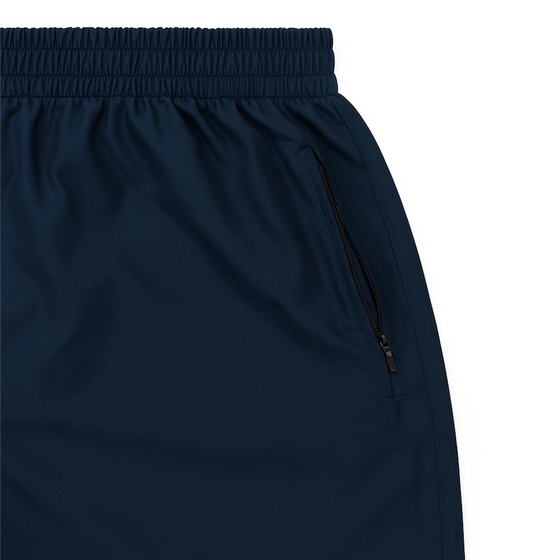 Plus-size male model wearing navy blue hybrid double-layer performance shorts with white t-shirt and sneakers