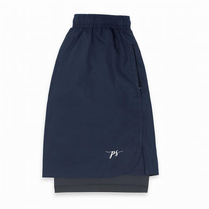 Plus-size male model wearing navy blue hybrid double-layer performance shorts with white t-shirt and sneakers