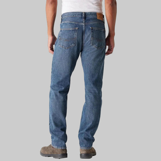 Men’s classic mid blue straight fit denim jeans made from 100% cotton, front view with regular leg opening and clean five-pocket design