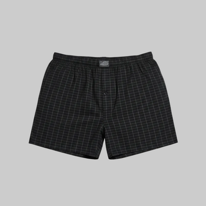 Classic black micro-check cotton boxer with elastic waistband, laid flat showing a clean and comfortable everyday design