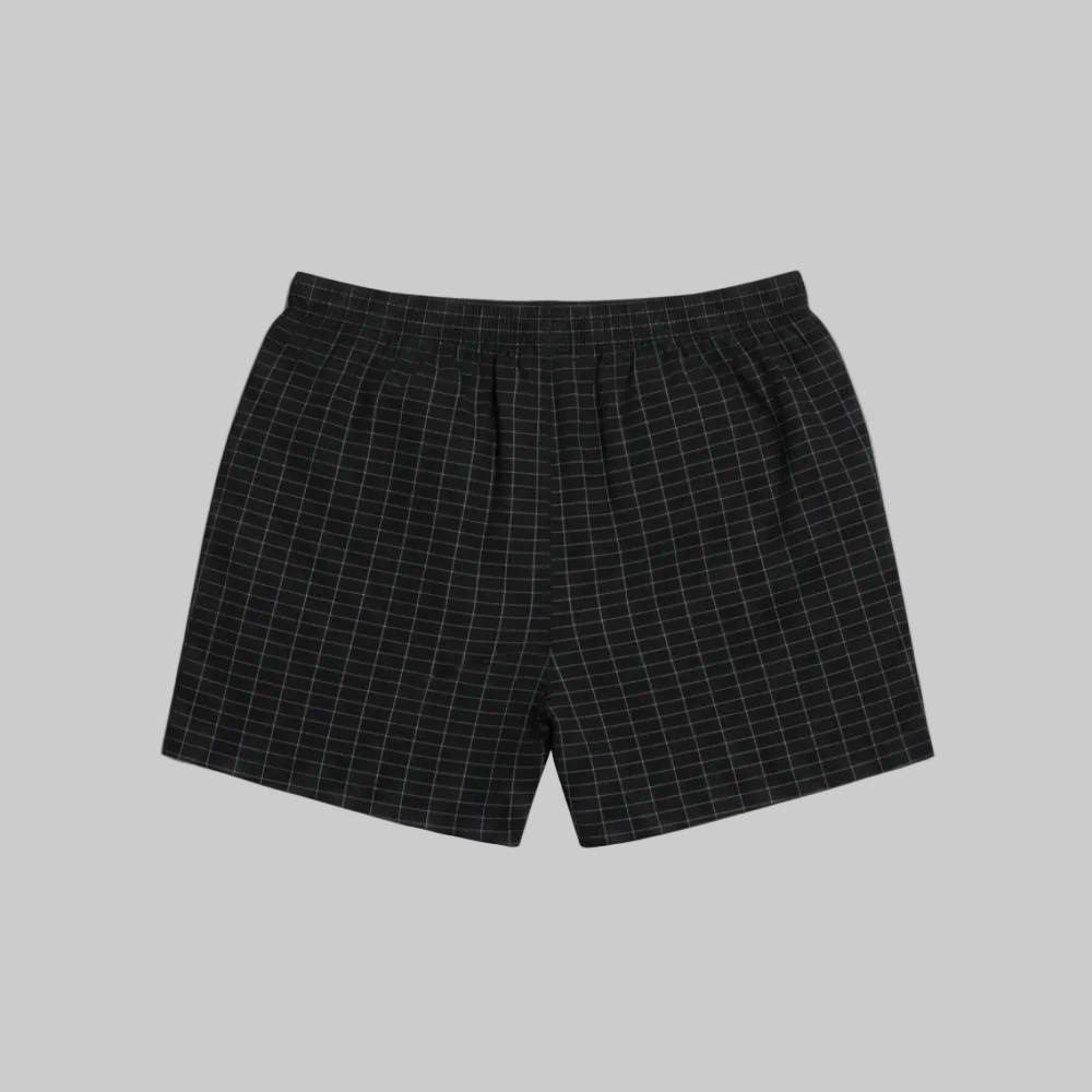 Classic black micro-check cotton boxer with elastic waistband, laid flat showing a clean and comfortable everyday design