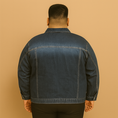Plus-size man wearing classic blue denim jacket with elastic cuffs and chest flap pockets

