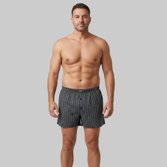 Classic charcoal micro-check cotton boxer with elastic waistband and button fly, laid flat showing a clean and comfortable everyday design