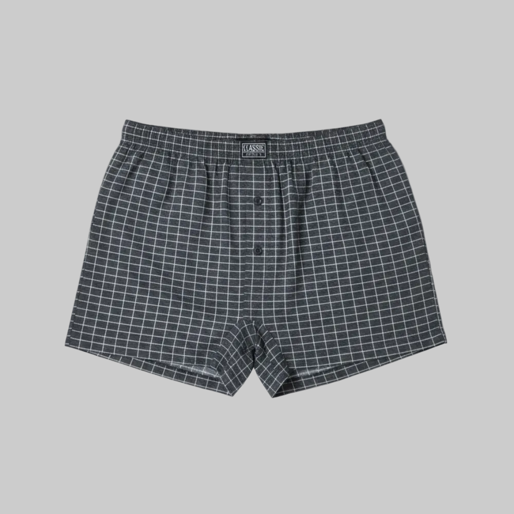 Classic charcoal micro-check cotton boxer with elastic waistband and button fly, laid flat showing a clean and comfortable everyday design