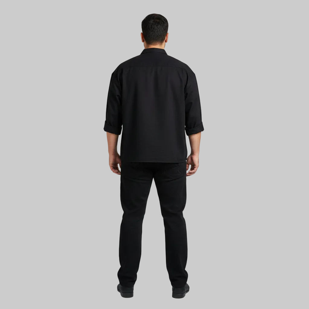 Classic jet black straight fit cotton denim jeans with button closure.