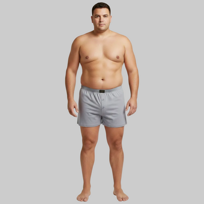 Classic light grey textured cotton boxer with elastic waistband and button fly, laid flat showing a clean and comfortable everyday design