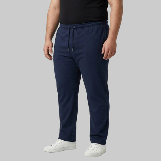 Classic Navy Cotton Jersey Trouser made from soft cotton jersey fabric with an elastic drawstring waistband for comfortable everyday casual wear.