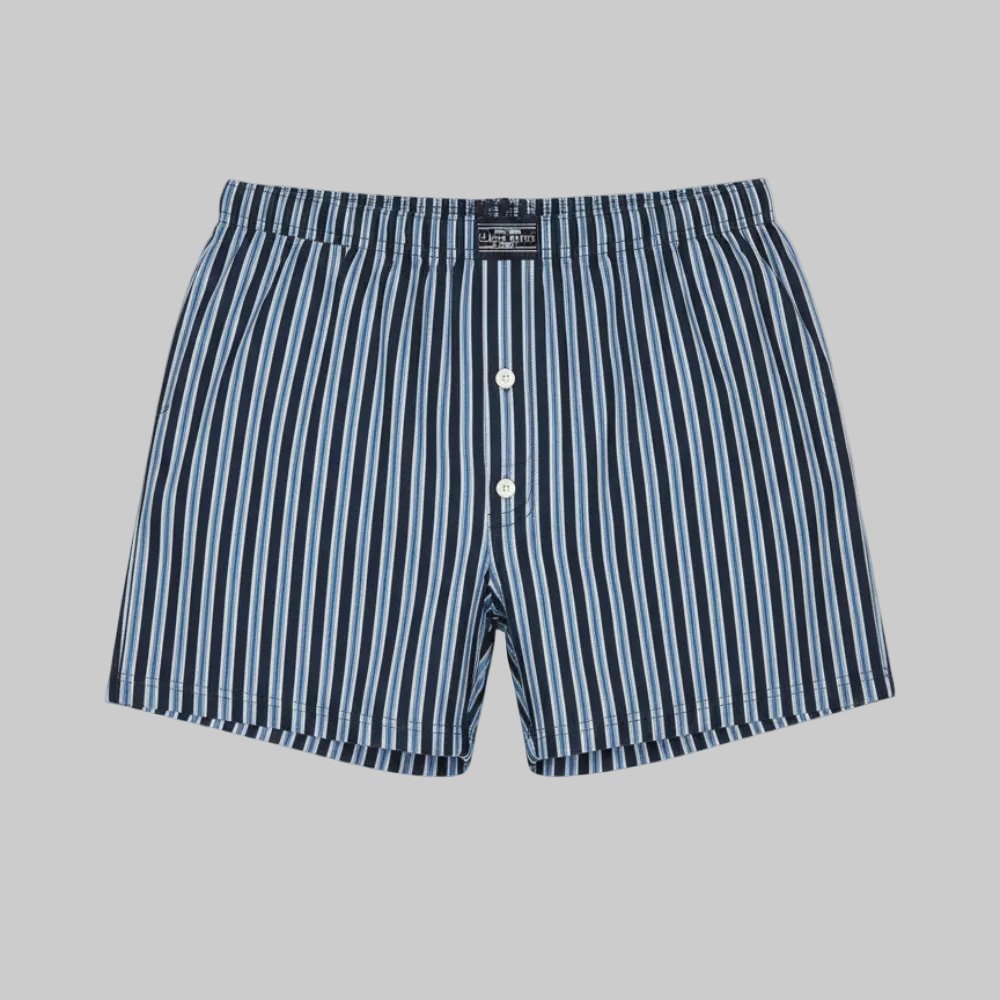 Classic navy and white vertical stripe cotton boxer with elastic waistband and button fly, laid flat showing a clean and comfortable everyday design