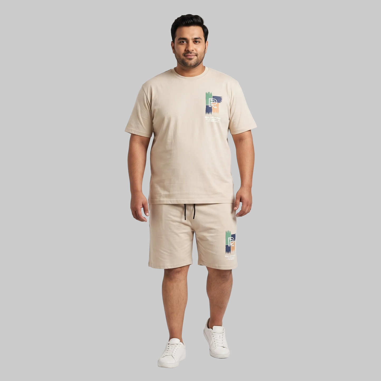 Men's Cream Beige Real Life Pursuit Graphic Interlock T-Shirt and Shorts Co-Ord Set with front chest print and large back graphic. 