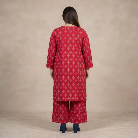 Red patterned kurta with palazzo pants on a beige background