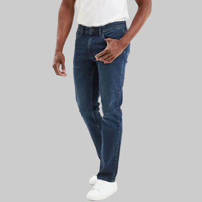 Dark blue denim regular fit jeans with classic five-pocket design and contrast stitching, laid flat for product display.