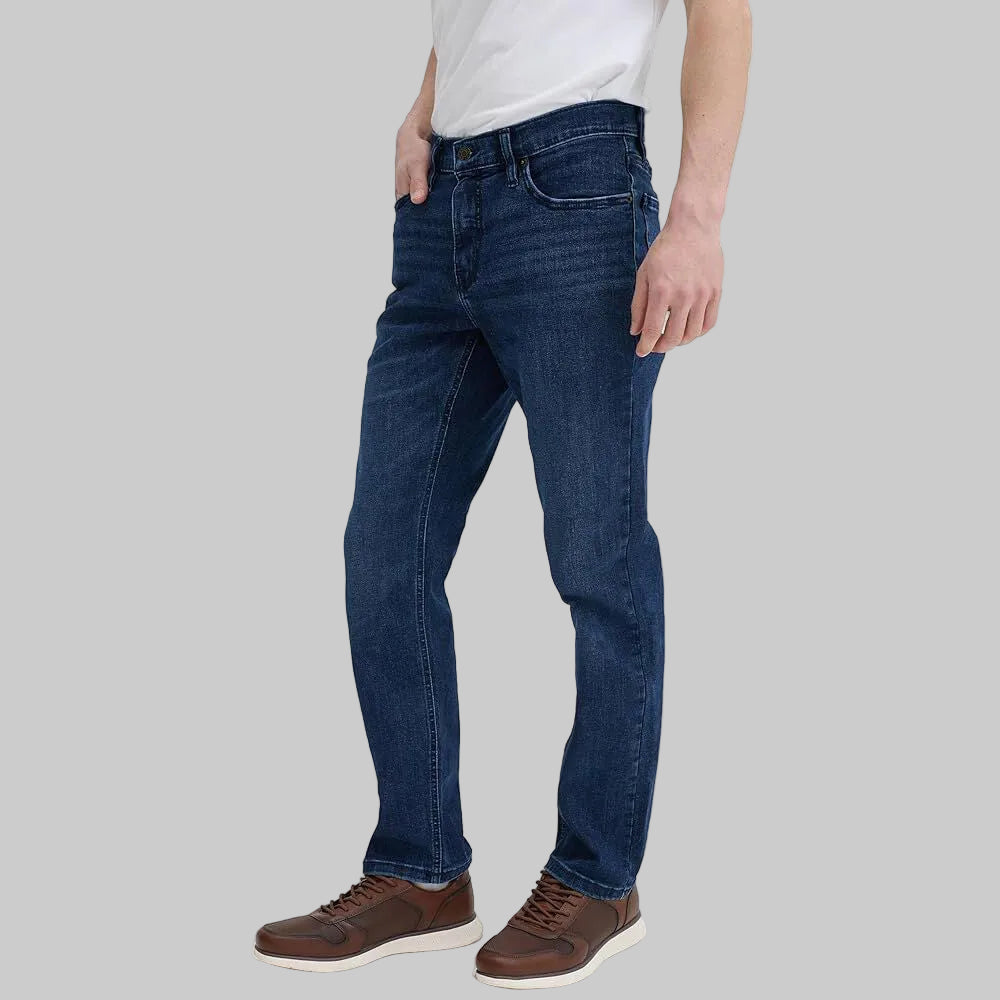 Dark blue slim fit men’s jeans with tapered legs and classic five-pocket styling