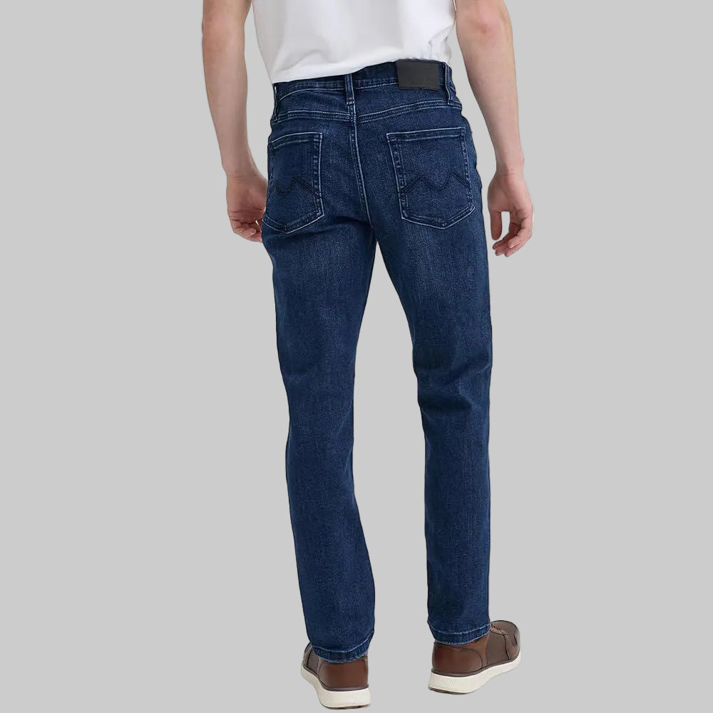Dark blue slim fit men’s jeans with tapered legs and classic five-pocket styling