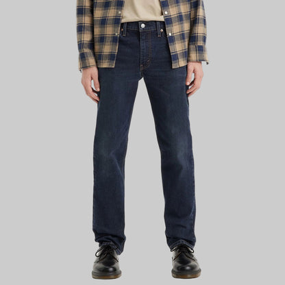 Flat lay of Dark Indigo Signature Slim Straight Jeans in dark indigo wash with high-stretch denim