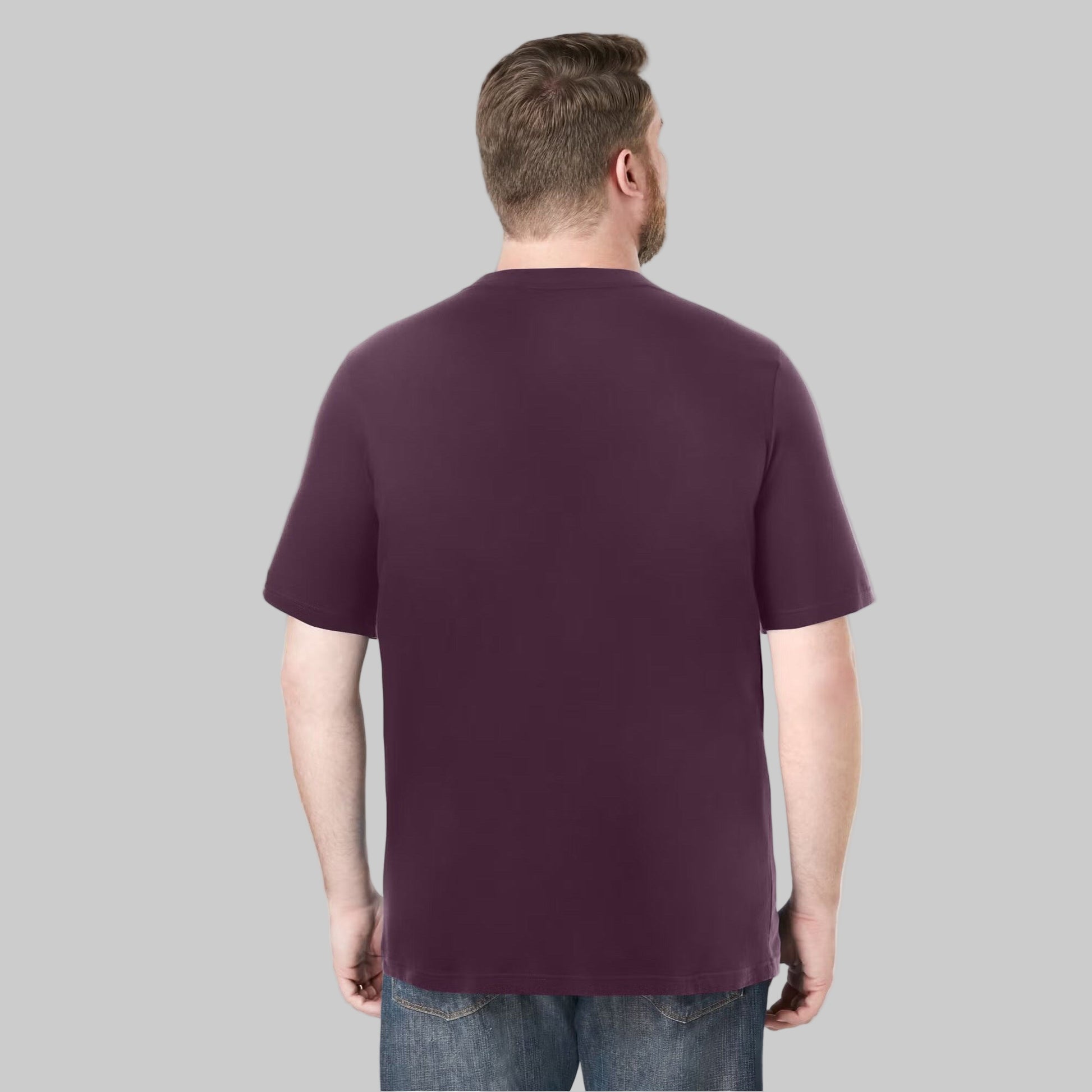 Plus-size male model wearing deep purple heavyweight crewneck T-shirt, relaxed fit, front view, studio background.