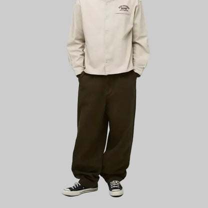 Men’s deep olive wide-leg pants with relaxed fit and clean design