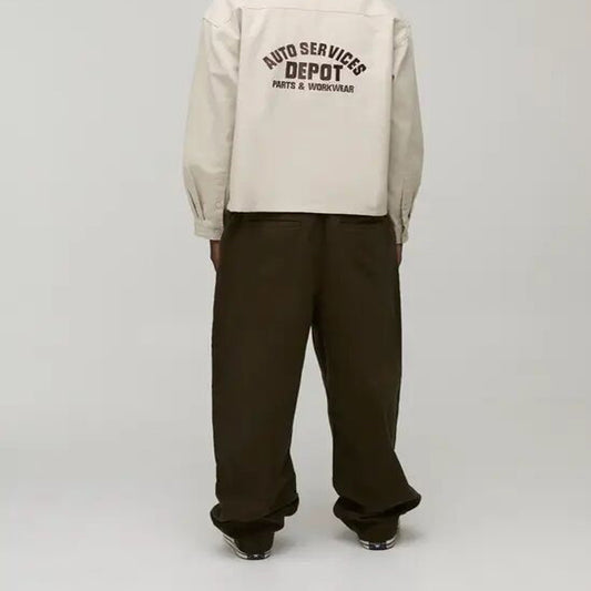 Men’s deep olive wide-leg pants with relaxed fit and clean design