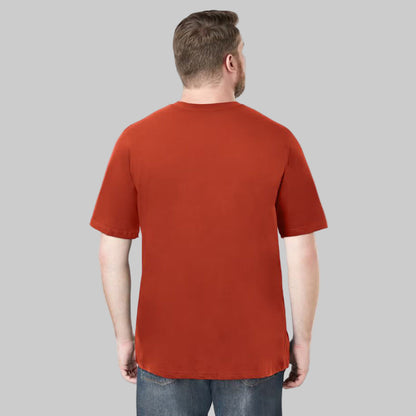 Plus-size Pakistani male model wearing desert red heavyweight crewneck T-shirt on a clean studio background.