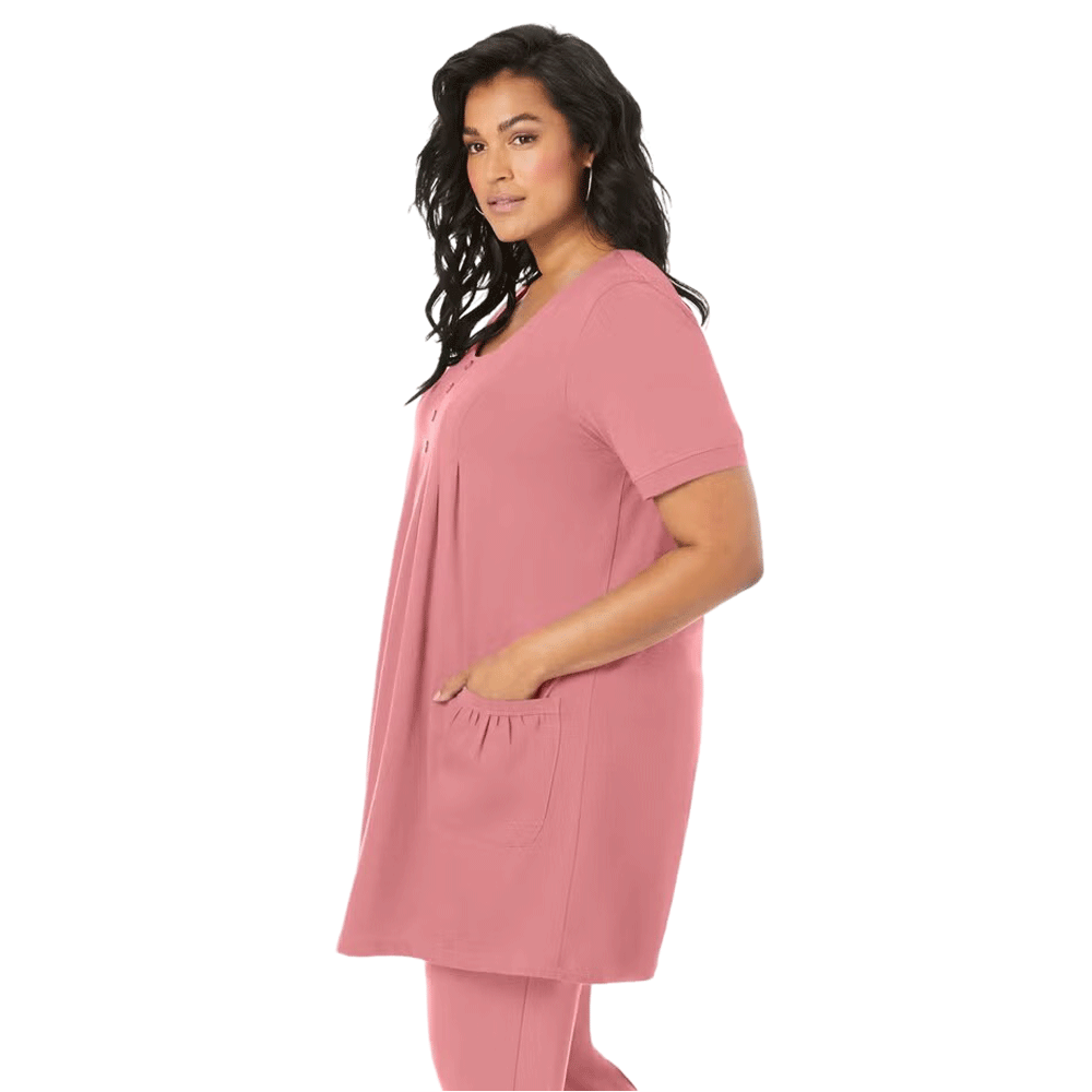 Desert Rose Two Pocket Soft Knit Tunic with short sleeves, scoop neckline, and two front pockets, designed for comfort and style in soft, breathable fabric.







