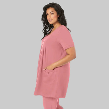 Desert Rose Two Pocket Soft Knit Tunic with short sleeves, scoop neckline, and two front pockets, designed for comfort and style in soft, breathable fabric.